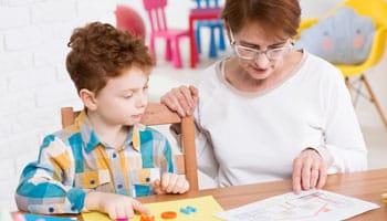 speech therapist child doctor learn letters